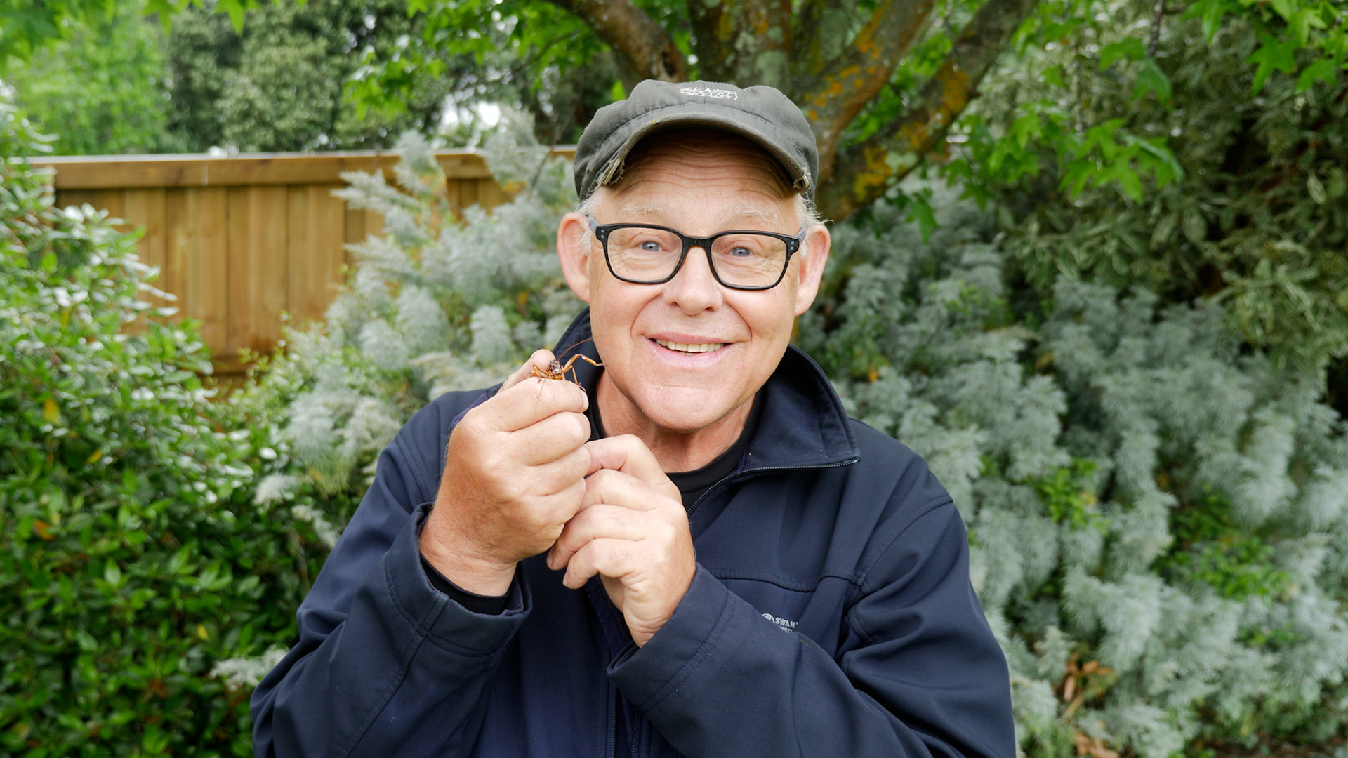 The Bugman, Ruud Kleinpaste smiling and holding a Weta