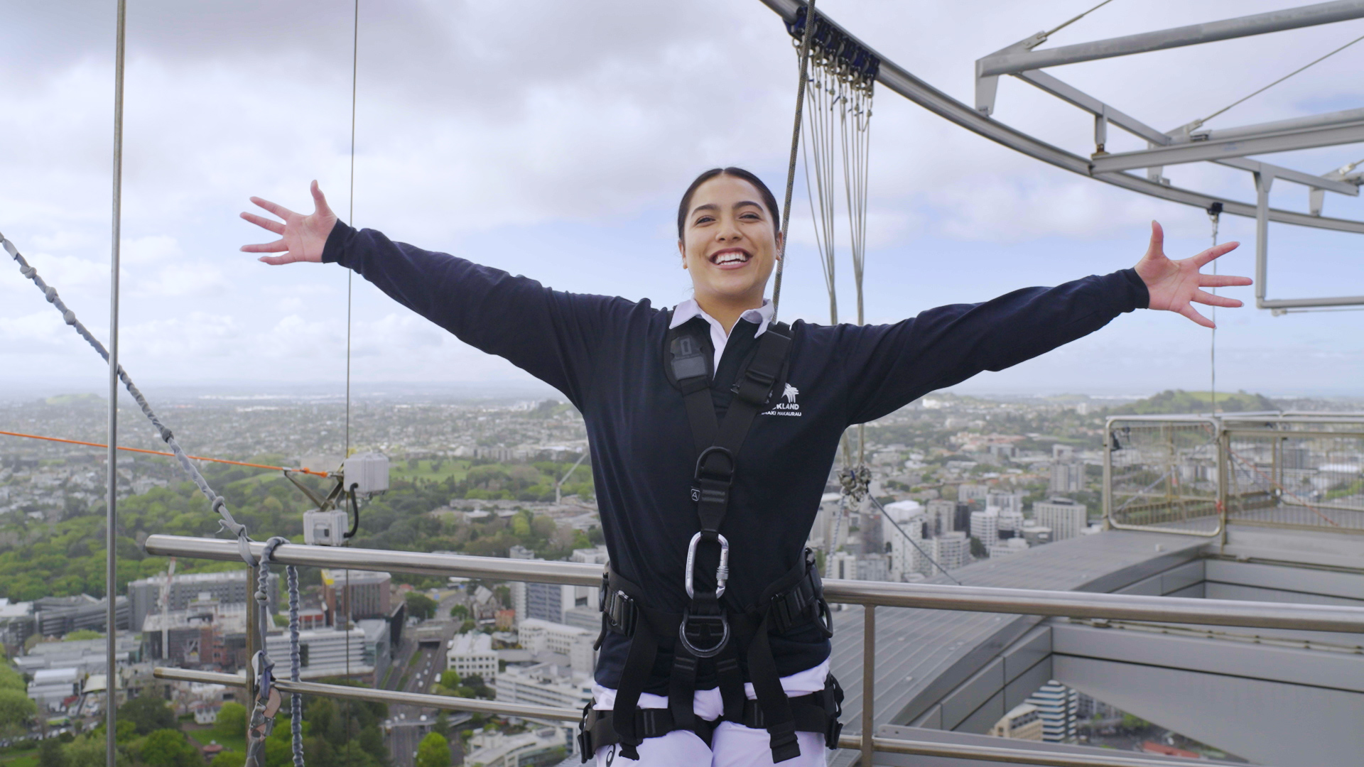 Girl on top of Sky Tower in Auckland.