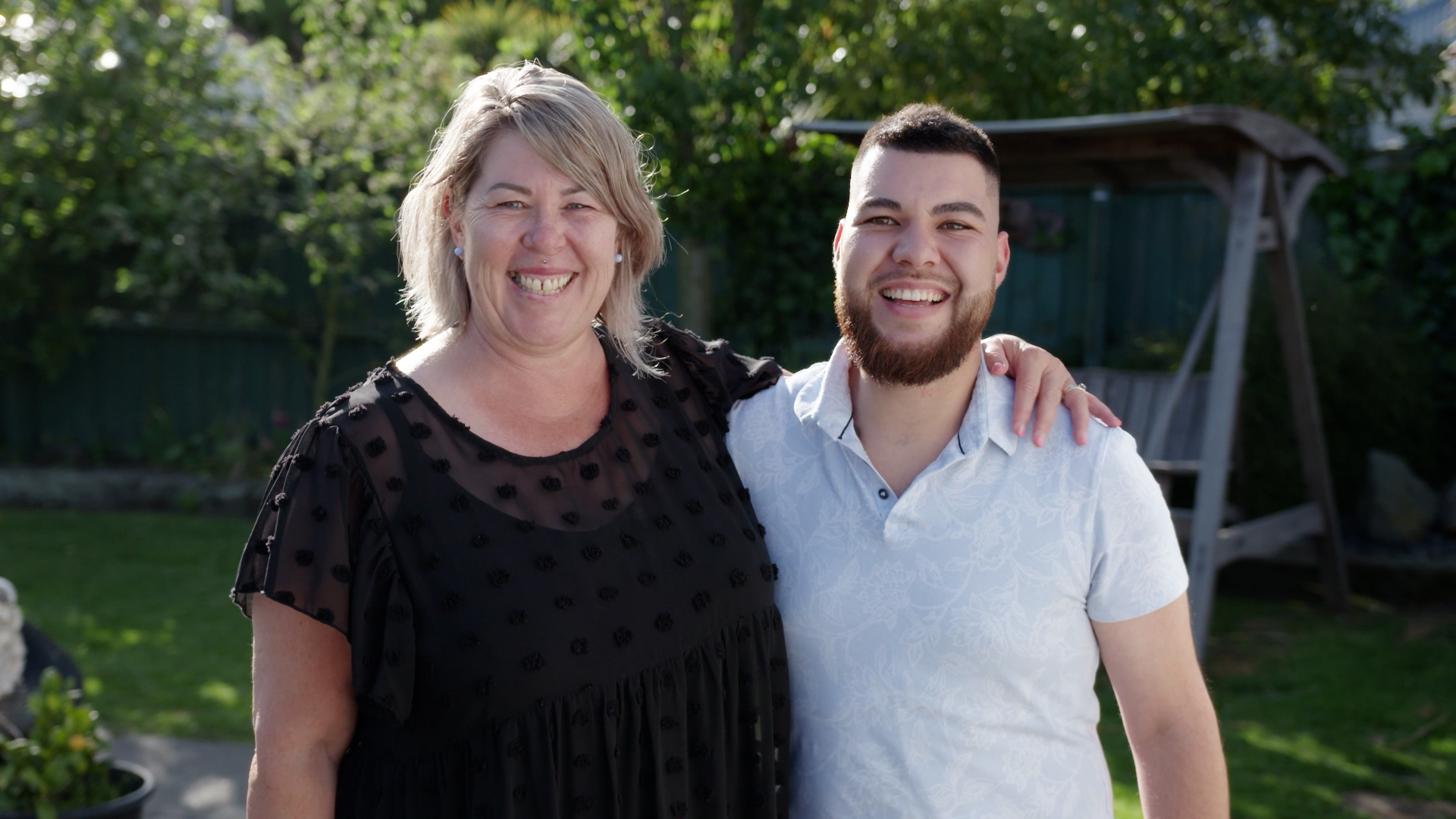Te Ramanui and his mum smiling