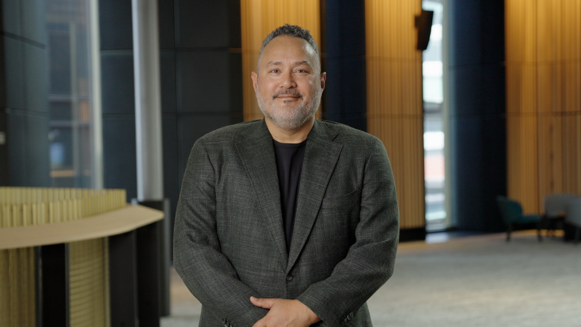 Andrew smiling to camera